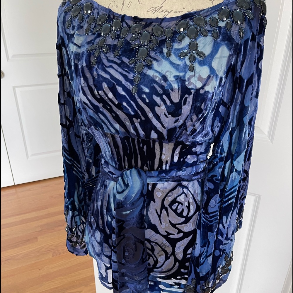 Blue blouse with decorative stones at neck and sleeves with self tie belt